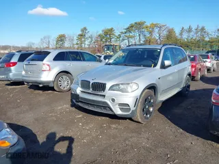 2011 BMW X5 35i with VIN 5UXZV4C59BL406947, listed as a IAAI auction lot 41684050 with 999,999 mi miles. Bid and sale history available at carsss.com. Image 2.
