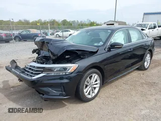 2020 Volkswagen Passat 2.0T SE with VIN 1VWWA7A30LC013193, listed as a IAAI auction lot 42127722 with 55,963 mi miles. Bid and sale history available at carsss.com. Image 2.