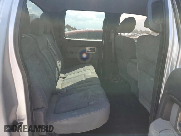 2011 Ford F-150 XLT z VIN 1FTFW1ET3BFC25031, wystawiony jako Copart lot #64101605 z przebiegiem 197 941 mil mil oraz Czysty tytuł • Clean title. Historia ofert i sprzedaży dostępna na DreamBid. Obrazek 10.