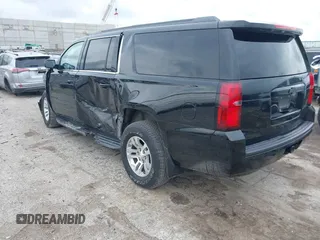 2020 Chevrolet Suburban LT with VIN 1GNSKHKC9LR103062, listed as a IAAI auction lot 42478008 with 229,786 mi miles and . Bid and sale history available at DreamBid. Image 3.