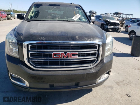 2015 GMC Yukon SLT with VIN 1GKS1BKC7FR113798, listed as a Copart auction lot 76425214 with 168,608 mi miles and Clean Title. Bid and sale history available at carsss.com. Image 5.
