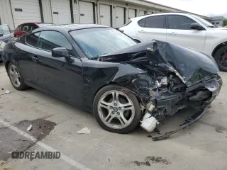 2006 Hyundai Tiburon GT z VIN KMHHN65F66U215304, wystawiony jako Copart lot #56141635 z przebiegiem 149 118 mil mil oraz Szkoda całkowita • Salvage title. Historia ofert i sprzedaży dostępna na DreamBid. Obrazek 4.