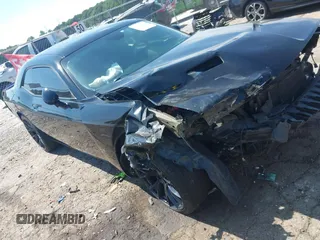2015 Dodge Challenger SXT Plus with VIN 2C3CDZBG4FH700550, listed as a IAAI auction lot 42311860 with 109,396 mi miles and . Bid and sale history available at DreamBid. Image 1.