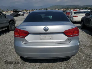 2012 Volkswagen Passat SE with VIN 1VWBP7A3XCC042049, listed as a Copart auction lot 55990465 with 116,659 mi miles and Salvage title. Bid and sale history available at DreamBid. Image 6.