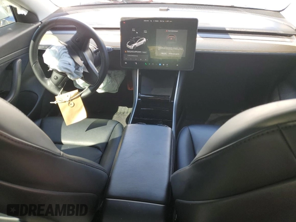 2020 Tesla Model 3 Standard Range Plus with VIN 5YJ3E1EA6LF661513, listed as a Copart auction lot 47008985 with 128,362 mi miles and Non Repairable. Bid and sale history available at DreamBid. Image 8.