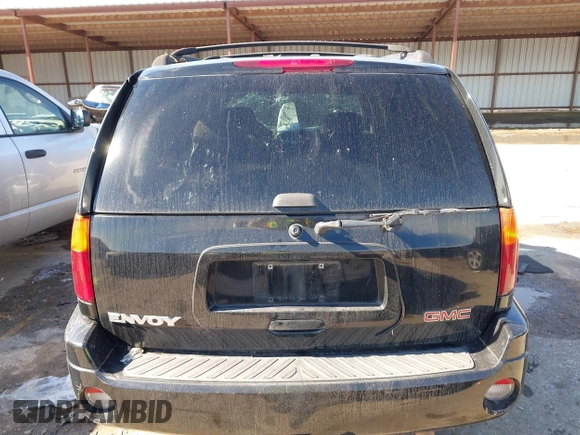 2003 GMC Envoy SLE with VIN 1GKDS13S732134354, listed as a IAAI auction lot 41305506 with 221,733 mi miles. Bid and sale history available at carsss.com. Image 16.