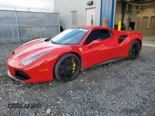 2017 Ferrari 488 z VIN ZFF80AMA6H0228173, wystawiony jako Copart lot #77401204 z przebiegiem 16 556 mil mil oraz Tytuł czysty. Historia ofert i sprzedaży dostępna na DreamBid. Obrazek 1.