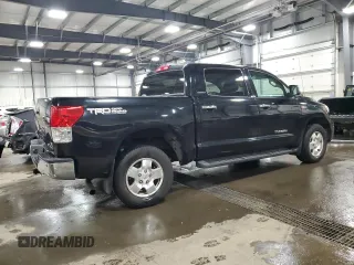 2013 Toyota Tundra Limited with VIN 5TFHW5F17DX284934, listed as a Copart auction lot 57240565 with 180,612 mi miles and Salvage title. Bid and sale history available at DreamBid. Image 3.
