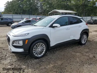 2021 Hyundai Kona SEL with VIN KM8K22AA1MU630349, listed as a Copart auction lot 73941114 with 71,557 mi miles and Salvage Title. Bid and sale history available at carsss.com. Image 1.