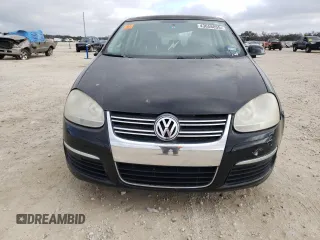2009 Volkswagen Jetta SE z VIN 3VWRM71K89M141488, wystawiony jako Copart lot #43658055 z przebiegiem Nie podano mil oraz Czysty tytuł • Clean title. Historia ofert i sprzedaży dostępna na DreamBid. Obrazek 5.