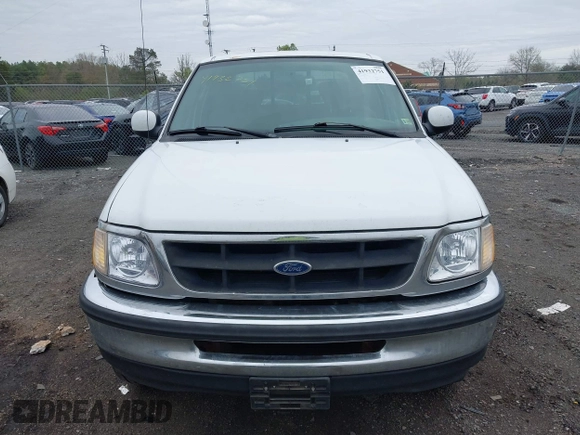 2003 Ford F-150 XLT with VIN 1FTRW08L43KA64328, listed as a IAAI auction lot 41932751 with 275,213 mi miles. Bid and sale history available at carsss.com. Image 12.