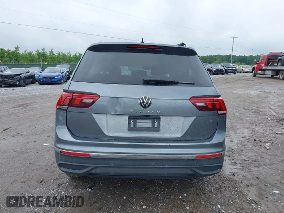 2022 Volkswagen Tiguan S with VIN 3VV1B7AX9NM005125, listed as a IAAI auction lot 42371110 with 94,060 mi miles and . Bid and sale history available at DreamBid. Image 16.