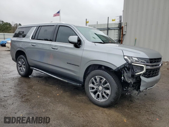 2024 Chevrolet Suburban LS with VIN 1GNSCBKD4RR220754, listed as a Copart auction lot 85854184 with 8,580 mi miles and Salvage Title. Bid and sale history available at DreamBid. Image 4.