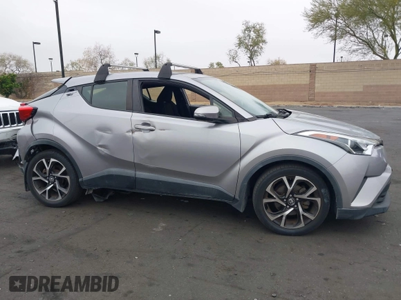 2018 Toyota C-HR XLE with VIN JTNKHMBX5J1011568, listed as a IAAI auction lot 42043867 with 30,699 mi miles. Bid and sale history available at carsss.com. Image 14.