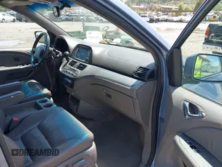 2010 Honda Odyssey Touring with VIN 5FNRL3H93AB058240, listed as a IAAI auction lot 42211192 with 223,859 mi miles and . Bid and sale history available at DreamBid. Image 5.