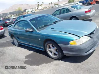 1997 Ford Mustang with VIN 1FALP4049VF200422, listed as a IAAI auction lot 42073947 with 157,937 mi miles. Bid and sale history available at carsss.com. Image 12.