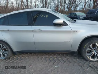 2012 BMW X6 50i z VIN 5UXFG8C58CL590171, wystawiony jako IAAI lot #41087730 z przebiegiem 83 143 mil mil oraz . Historia ofert i sprzedaży dostępna na DreamBid. Obrazek 13.