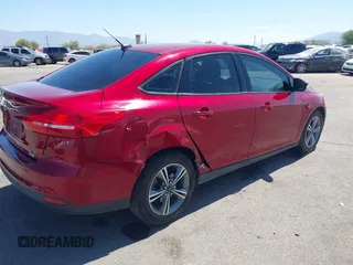 2017 Ford Focus SE with VIN 1FADP3FE3HL206074, listed as a IAAI auction lot 42594911 with 143,814 mi miles and . Bid and sale history available at DreamBid. Image 4.