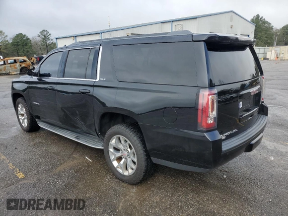 2016 GMC Yukon XL SLE with VIN 1GKS1FKCXGR479666, listed as a Copart auction lot 46640135 with 106,345 mi miles and Salvage Title. Bid and sale history available at carsss.com. Image 2.