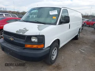 2014 Chevrolet Express Cargo Van with VIN 1GCWGGCA4E1209164, listed as a IAAI auction lot 41838141 with 174,770 mi miles. Bid and sale history available at carsss.com. Image 2.