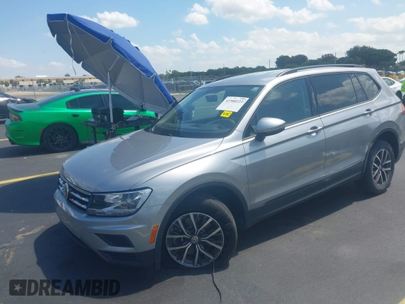 2021 Volkswagen Tiguan S with VIN 3VV1B7AX7MM117954, listed as a IAAI auction lot 42300223 with 45,587 mi miles and . Bid and sale history available at DreamBid. Image 17.