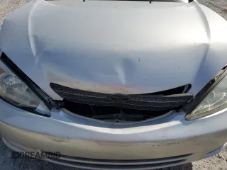 2002 Toyota Camry XLE z VIN 4T1BF32K22U532171, wystawiony jako Copart lot #54527965 z przebiegiem 165 637 mil mil oraz Szkoda całkowita • Salvage title. Historia ofert i sprzedaży dostępna na DreamBid. Obrazek 11.