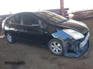 2007 Toyota Prius with VIN JTDKB20U277597719, listed as a IAAI auction lot 42153731 with 148,174 mi miles and . Bid and sale history available at DreamBid. Image 1.
