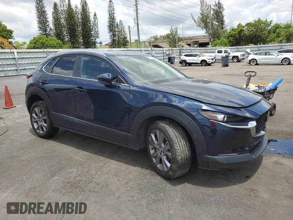 2023 Mazda CX-30 S Preferred with VIN 3MVDMBCM2PM555893, listed as a Copart auction lot 58480415 with 24,812 mi miles and Non repairable. Bid and sale history available at DreamBid. Image 4.