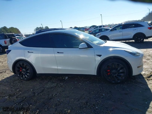 2022 Tesla Model Y Performance with VIN 7SAYGDEF7NF537401, listed as a IAAI auction lot 41540346 with NaN miles. Bid and sale history available at carsss.com. Image 13.
