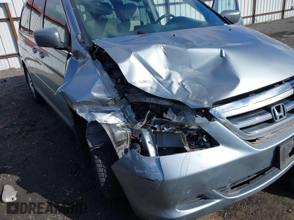 2007 Honda Odyssey EX with VIN 5FNRL384X7B119757, listed as a IAAI auction lot 41809763 with 163,526 mi miles and . Bid and sale history available at DreamBid. Image 6.