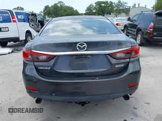 2016 Mazda 6 i Sport with VIN JM1GJ1U53G1409301, listed as a IAAI auction lot 42057930 with 100,434 mi miles and . Bid and sale history available at DreamBid. Image 17.