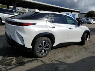 2023 Lexus RZ 450e Premium z VIN JTJAAAAB7PA021503, wystawiony jako Copart lot #41259754 z przebiegiem 1150 mil mil oraz . Historia ofert i sprzedaży dostępna na DreamBid. Obrazek 3.