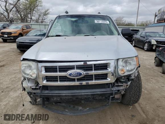 2012 Ford Escape XLT с VIN 1FMCU9DG1CKB43394, выставлен на аукционе Copart как лот 50713325 с пробегом 161 198 миль миль и Списание • Salvage title. История ставок и продаж доступна на DreamBid. Изображение 5.