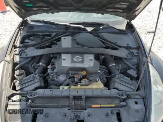 2013 Nissan 370Z Touring z VIN JN1AZ4EH0DM380992, wystawiony jako Copart lot #52194335 z przebiegiem 73 764 mil mil oraz Szkoda całkowita • Salvage title. Historia ofert i sprzedaży dostępna na DreamBid. Obrazek 11.