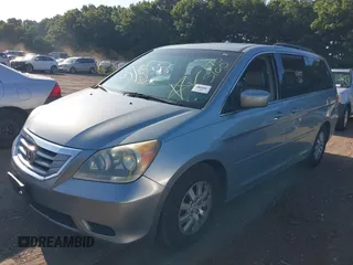 2008 Honda Odyssey EX-L with VIN 5FNRL38718B053448, listed as a IAAI auction lot 40182359 with 164,902 mi miles and . Bid and sale history available at DreamBid. Image 2.