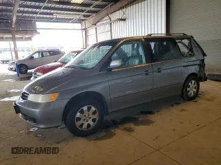 2002 Honda Odyssey EX-L with VIN 2HKRL18952H563137, listed as a Copart auction lot 64602445 with Not provided miles and Salvage title. Bid and sale history available at DreamBid. Image 1.