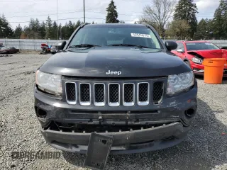 2013 Jeep Compass Sport with VIN 1C4NJCBB8DD246621, listed as a Copart auction lot 52545315 with 113,856 mi miles and Salvage Title. Bid and sale history available at carsss.com. Image 5.