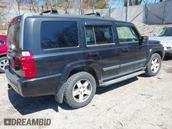 2009 Jeep Commander Sport with VIN 1J8HG48P79C541817, listed as a IAAI auction lot 41906053 with 189,436 mi miles. Bid and sale history available at carsss.com. Image 4.