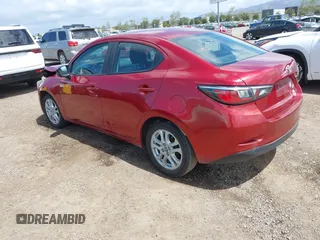 2018 Toyota Yaris with VIN 3MYDLBYV1JY301213, listed as a IAAI auction lot 41944203 with 156,641 mi miles and . Bid and sale history available at DreamBid. Image 3.