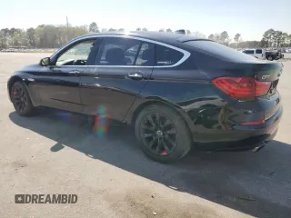 2014 BMW 5 Series GT 550i xDrive with VIN WBA5M0C5XED084908, listed as a Copart auction lot 50619945 with 97,680 mi miles and Salvage Title. Bid and sale history available at carsss.com. Image 2.