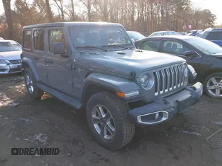 2021 Jeep Wrangler Unlimited Sahara z VIN 1C4HJXEG6MW824800, wystawiony jako IAAI lot #41429585 z przebiegiem 74 938 mil mil oraz . Historia ofert i sprzedaży dostępna na DreamBid. Obrazek 1.