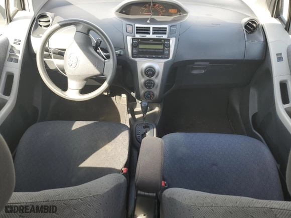2009 Toyota Yaris with VIN JTDKT903495224256, listed as a Copart auction lot 50065565 with 164,473 mi miles and Salvage Title. Bid and sale history available at carsss.com. Image 8.