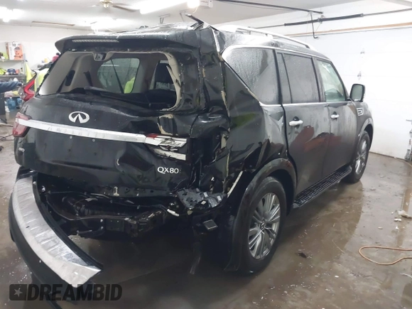 2021 Infiniti QX80 Luxe with VIN JN8AZ2AE7M9271868, listed as a IAAI auction lot 41220686 with 60,782 mi miles and . Bid and sale history available at DreamBid. Image 4.
