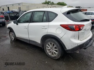 2016 Mazda CX-5 Sport z VIN JM3KE4BY2G0802376, wystawiony jako Copart lot #55976585 z przebiegiem 112 600 mil mil oraz Szkoda całkowita • Salvage title. Historia ofert i sprzedaży dostępna na DreamBid. Obrazek 2.