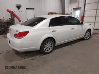 2010 Toyota Avalon XL with VIN 4T1BK3DB9AU358803, listed as a IAAI auction lot 41072257 with 157,185 mi miles and . Bid and sale history available at DreamBid. Image 4.