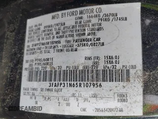 2005 Ford Focus S with VIN 3FAFP31N65R107956, listed as a IAAI auction lot 42686748 with 31,935 mi miles and . Bid and sale history available at DreamBid. Image 9.