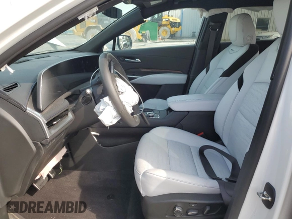 2024 Cadillac XT4 AWD Sport с VIN 1GYFZFR47RF125557, выставлен на аукционе Copart как лот 70869104 с пробегом 8 714 миль миль и Списание • Salvage title. История ставок и продаж доступна на DreamBid. Изображение 7.