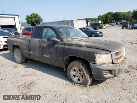 2008 Dodge Dakota z VIN 1D7HW32K58S571930, wystawiony jako Copart lot #69245074 z przebiegiem Nie podano mil oraz Szkoda całkowita • Salvage title. Historia ofert i sprzedaży dostępna na DreamBid. Obrazek 4.