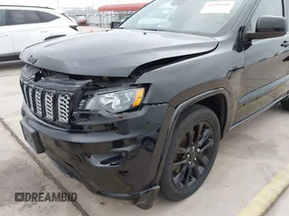 2021 Jeep Grand Cherokee Laredo X with VIN 1C4RJEAG8MC714539, listed as a IAAI auction lot 42190686 with 59,359 mi miles and . Bid and sale history available at DreamBid. Image 17.