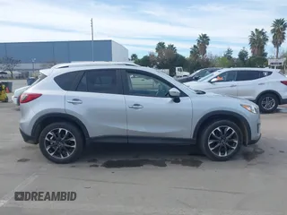 2016 Mazda CX-5 Grand Touring with VIN JM3KE2DY9G0723921, listed as a IAAI auction lot 41681522 with 83,893 mi miles. Bid and sale history available at carsss.com. Image 13.
